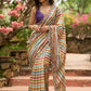 Stunning multicolor striped printed saree highlighted with elegant bold mirror work embroidery