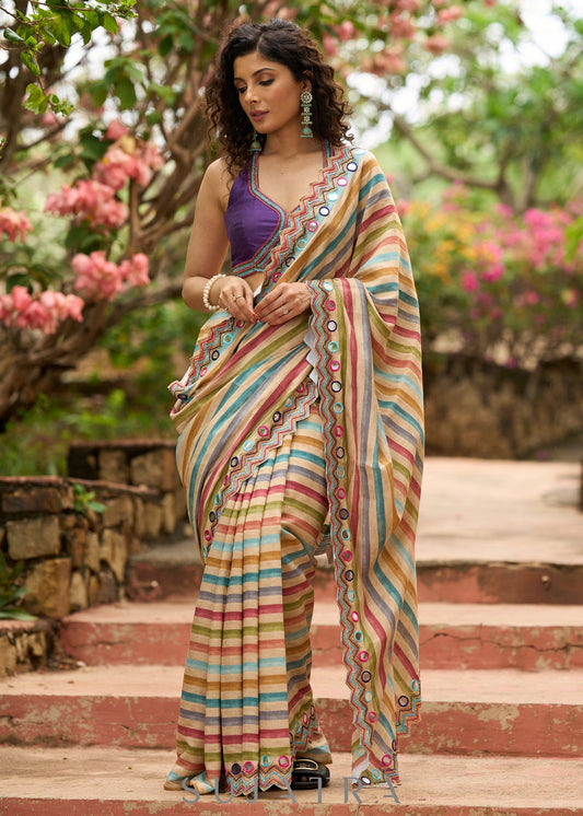 Stunning multicolor striped printed saree highlighted with elegant bold mirror work embroidery