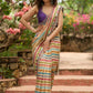 Stunning multicolor striped printed saree highlighted with elegant bold mirror work embroidery