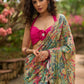 Exclusive multicolor floral print saree highlighted with overall pitta embroidery