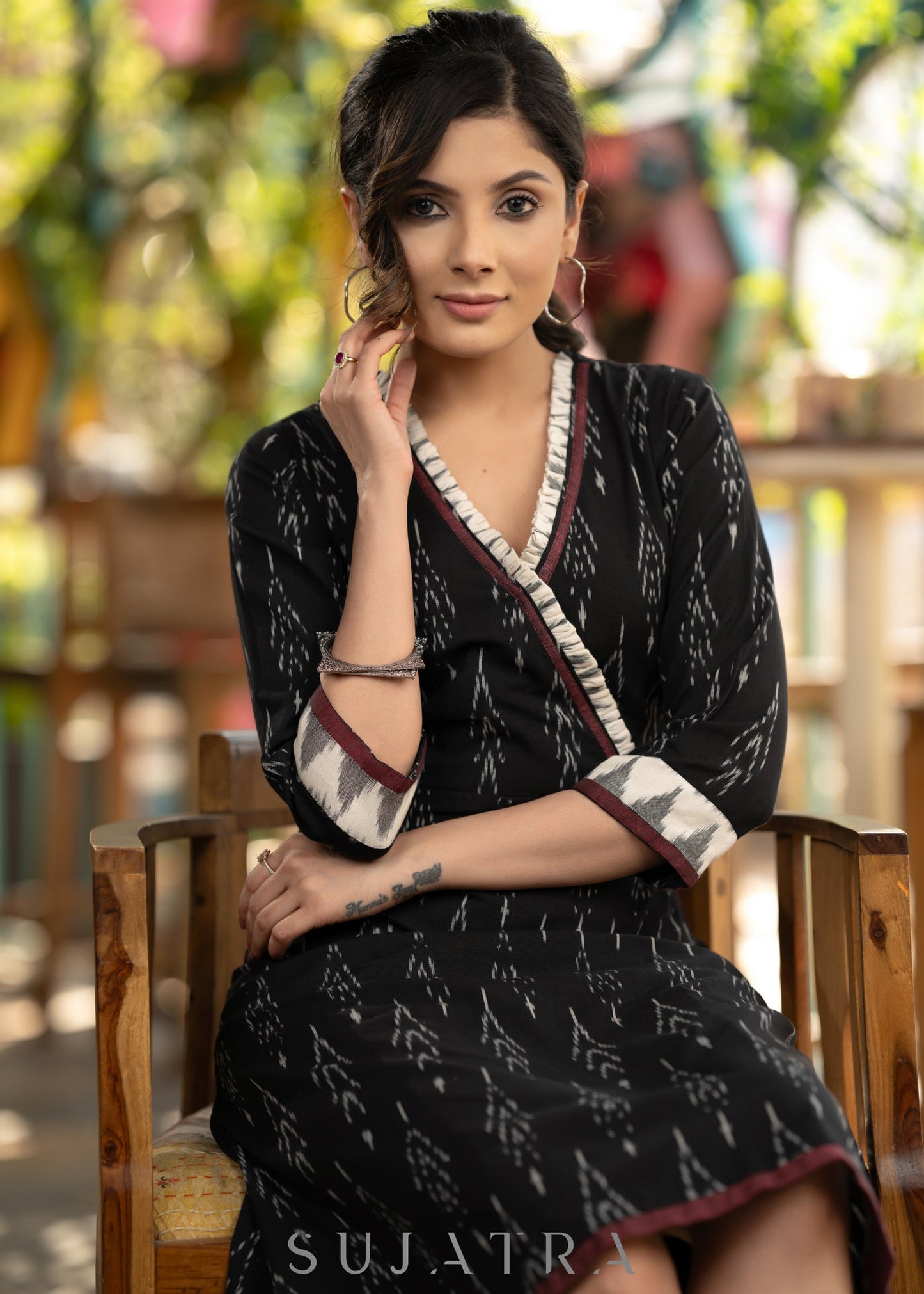 Trendy black cotton ikat dress highlighted with ikat gathering on yoke