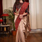 Beige silk cotton saree with block printed Ajrakh border