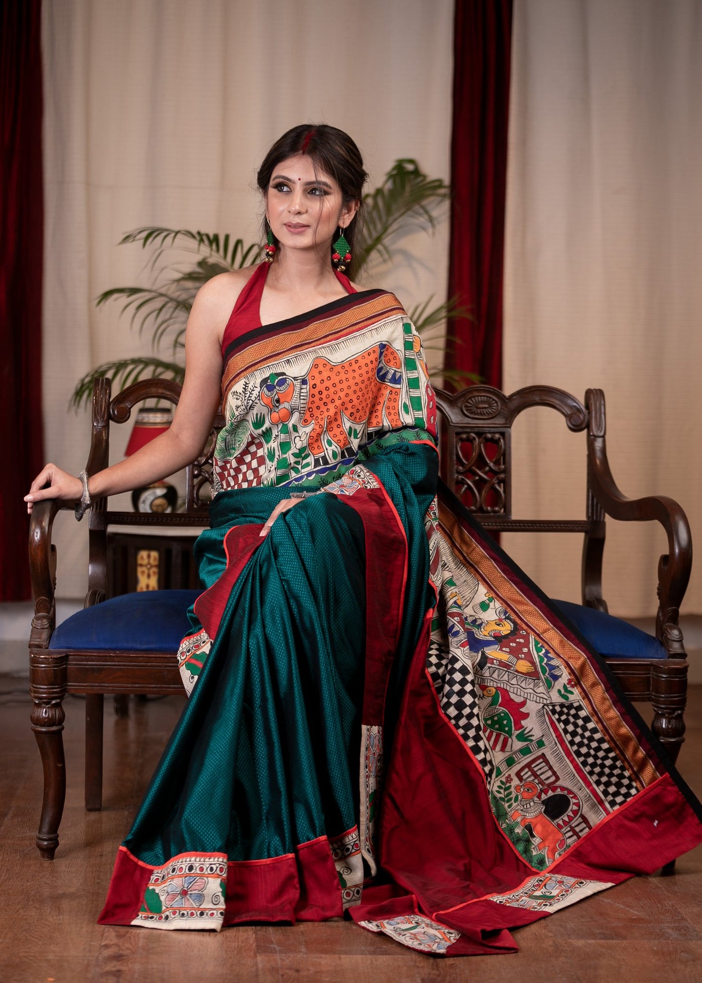 Teal khun saree with hand painted Madhubani border