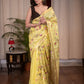 Exclusive embroidered yellow pure linen saree