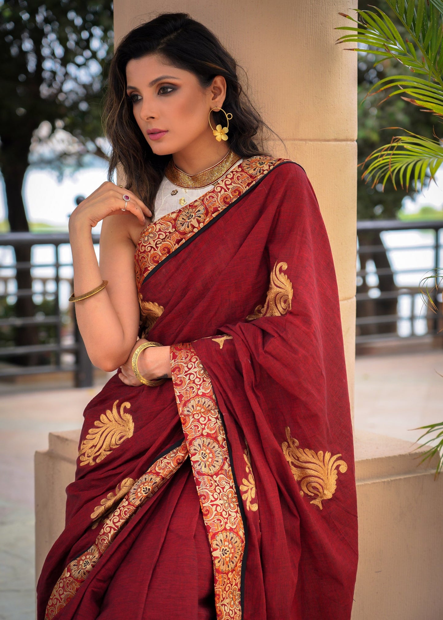 Maroon cotton saree with exclusive embroidered motifs and banarasi border