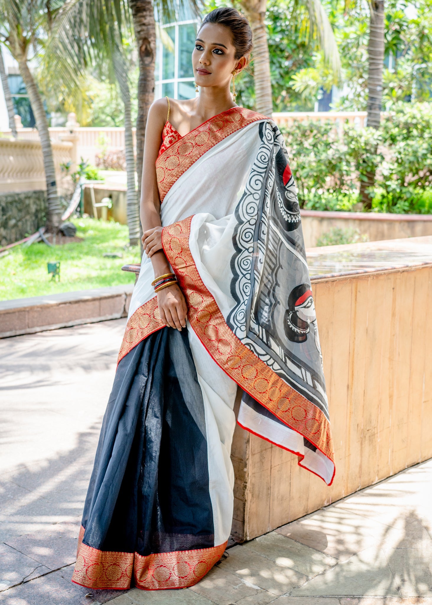 Exquisite white and black Chanderi handpainted saree with banarasi border