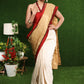 Exclusive off-white Cotton silk with gold brocade saree & Zari motif on pleats