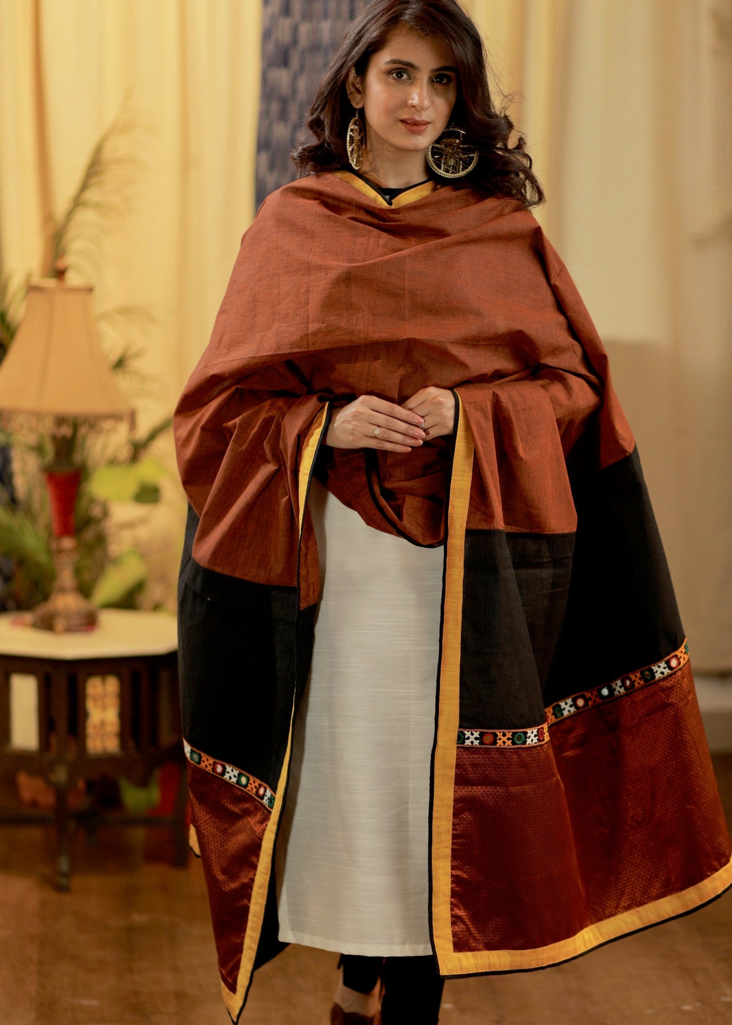 Rust Cotton Handloom Dupatta with Handmade Kutch embroidery and Khun work.