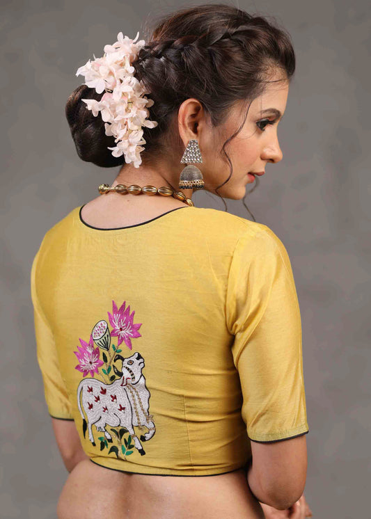 Classy Yellow Chanderi Blouse with Beautiful Cow Embroidered Motif on The Back