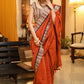 Exquisite rust Cotton plain saree with line Ajrakh border