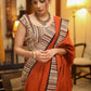 Exquisite rust Cotton plain saree with line Ajrakh border