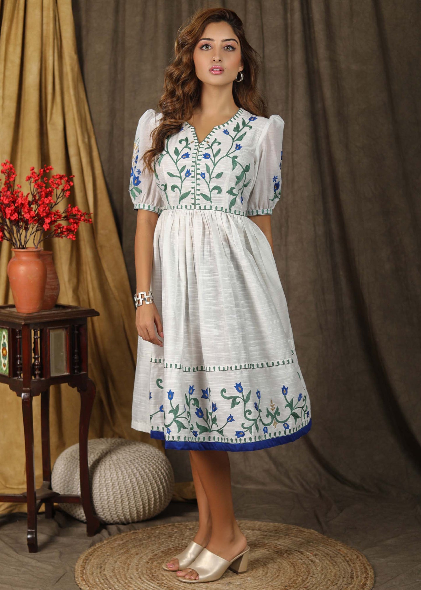 Stylish classic white  cotton silk gathered dress with elegant embroidery paired with chanderi sleeves