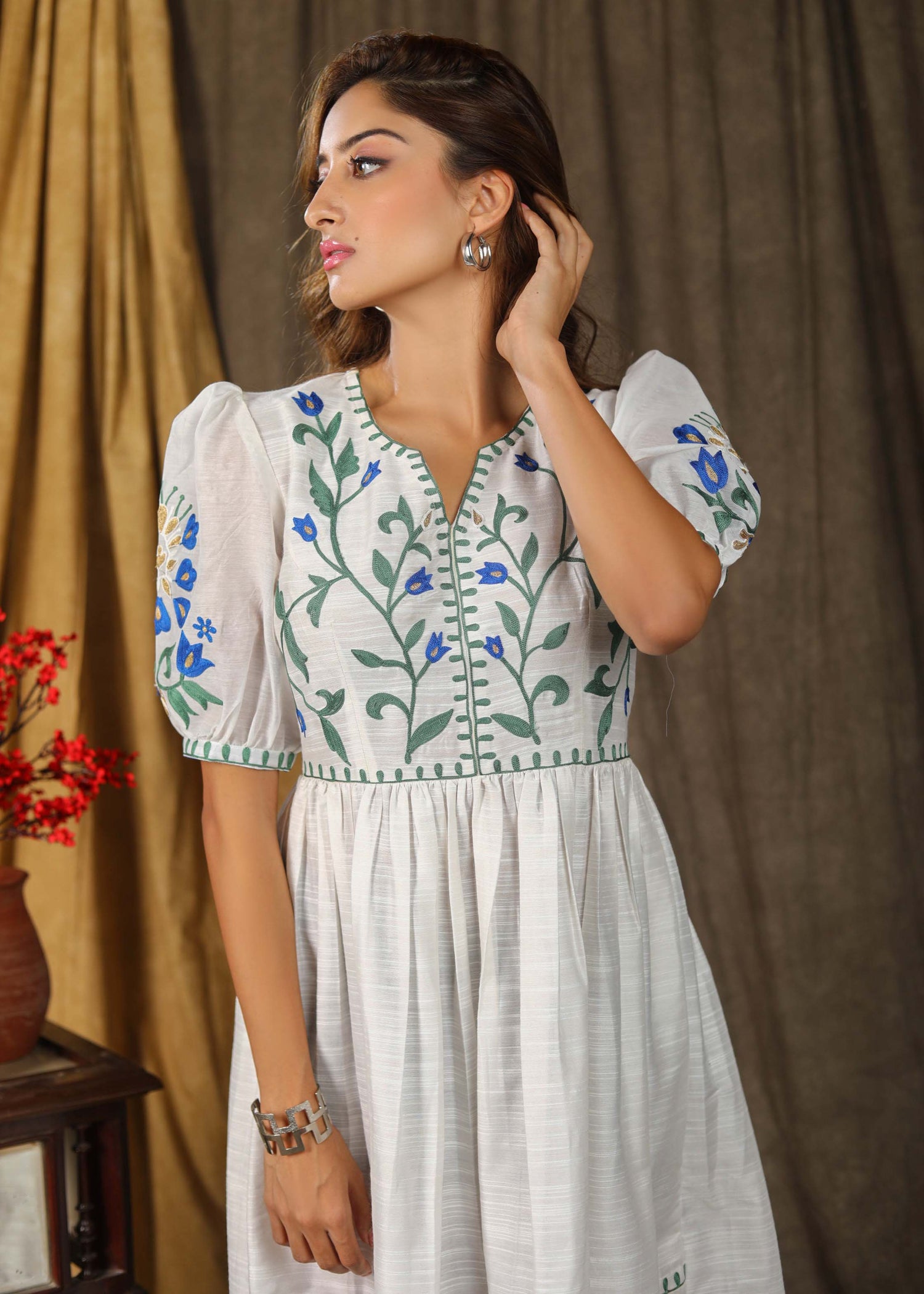 Stylish classic white  cotton silk gathered dress with elegant embroidery paired with chanderi sleeves