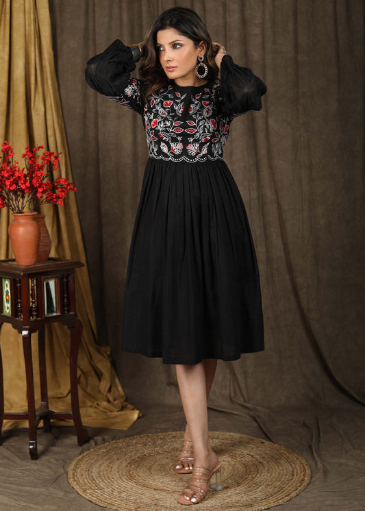 Trendy black cotton gathered dress with beautiful zari embroidery combined with chanderi sleeves