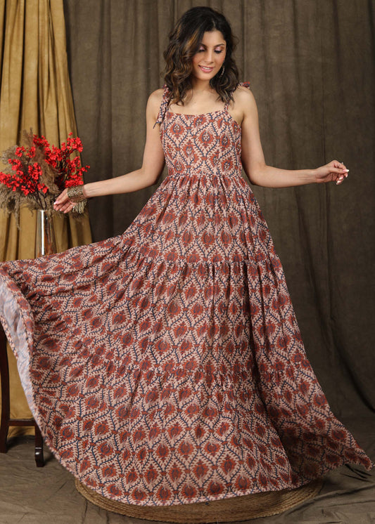 Exclusive boroque print peach maxi dress highlighted with stone embellishments and optional chanderi shrug