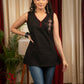 Black sleeveless top with embroidered motif