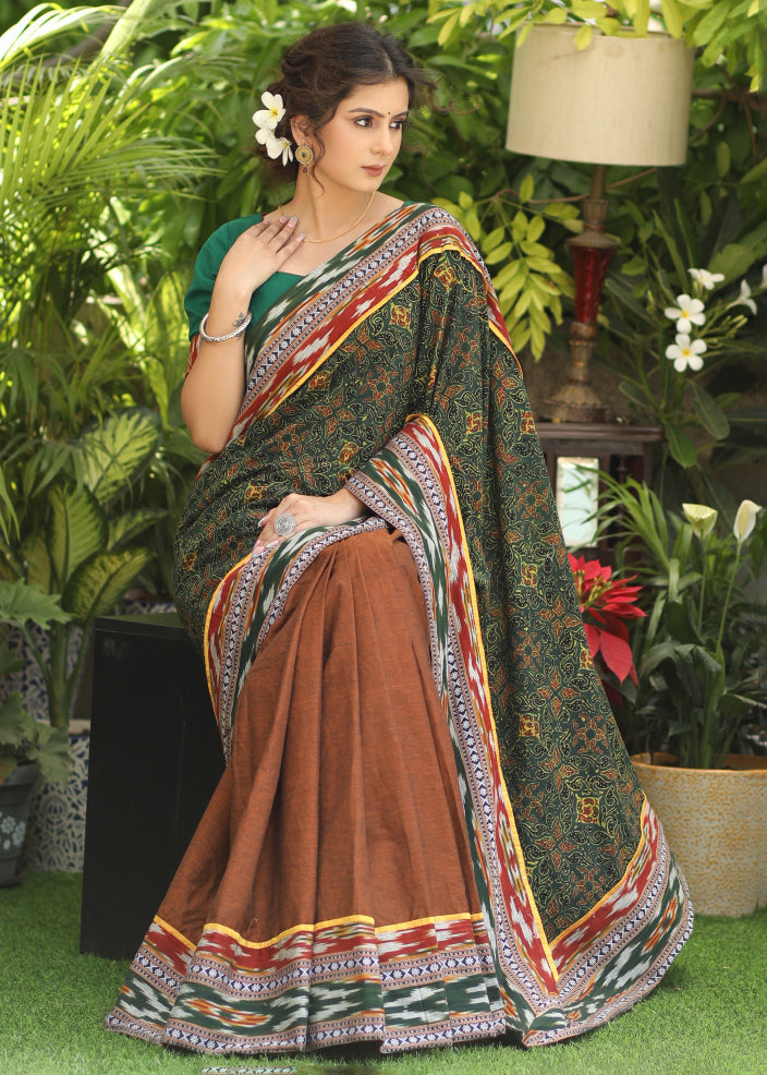 Standout brown Cotton saree with Ajrakh combination Pallu with Gorgeous Ikaat border