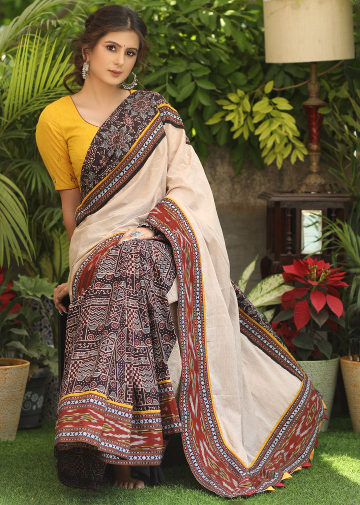 Smart cotton Ajrakh & plain cream Cotton saree with beautiful Ikaat, Ajrakh border