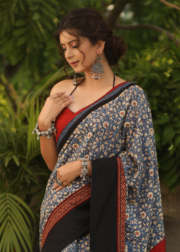 Spring bloom blue printed saree with Ajrakh and Cotton silk combination border with red stone Embellishment