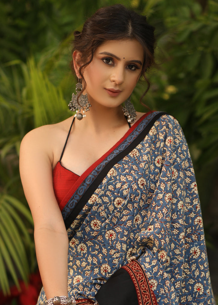 Spring bloom blue printed saree with Ajrakh and Cotton silk combination border with red stone Embellishment