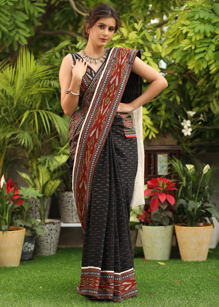 Classy black Ikat saree with Ajrakh & Ikat combination border