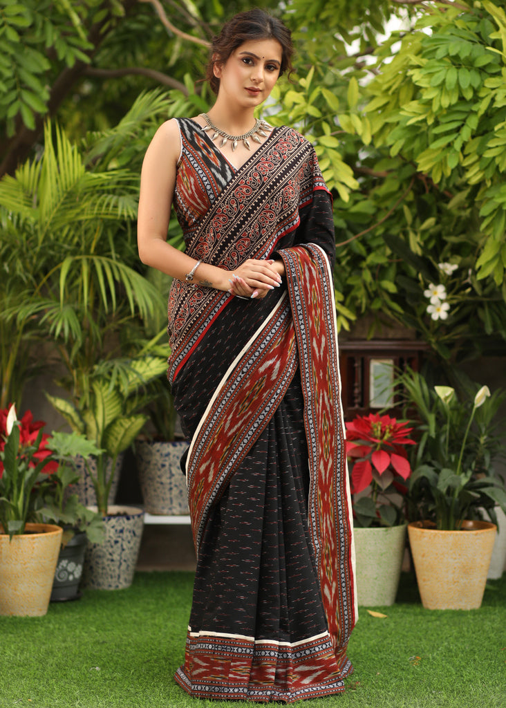 Classy black Ikat saree with Ajrakh & Ikat combination border