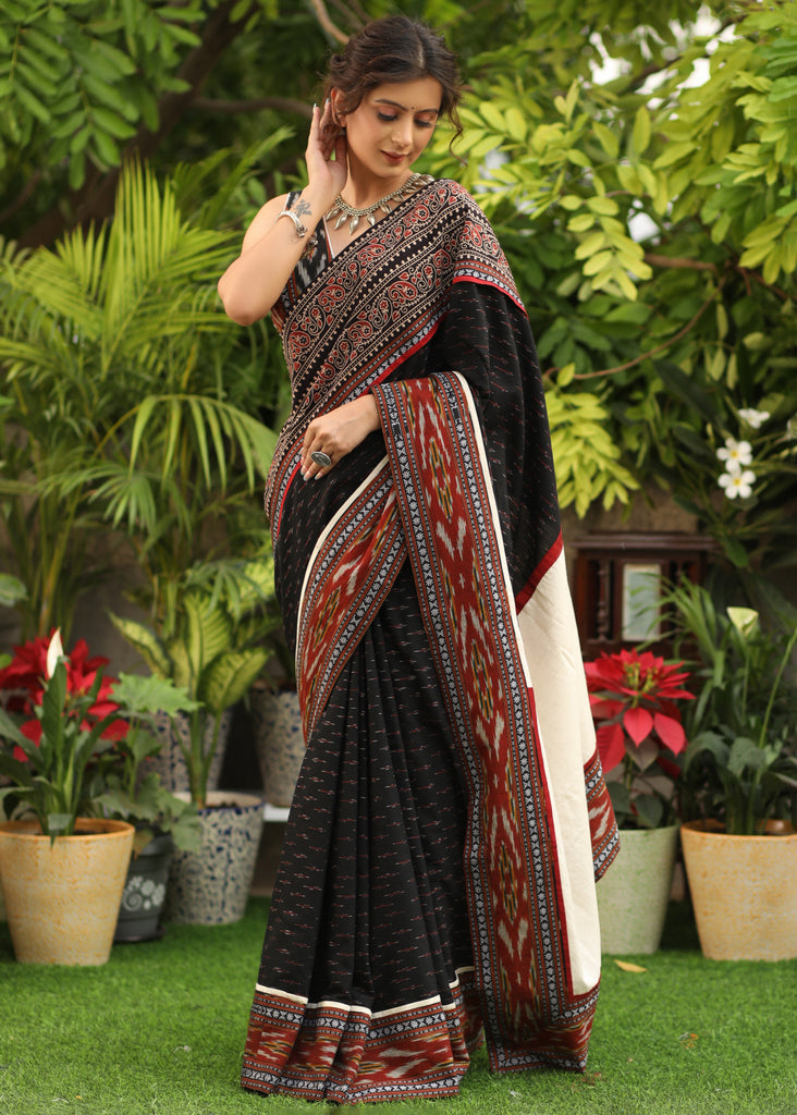 Classy black Ikat saree with Ajrakh & Ikat combination border