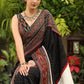 Classy black Ikat saree with Ajrakh & Ikat combination border