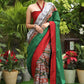 Serene Ikat cotton saree with green pallu and grey pleated border