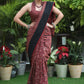 Sensuous maroon Ajrakh saree with black border & Accentuated with stone embellishment