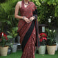 Sensuous maroon Ajrakh saree with black border & Accentuated with stone embellishment