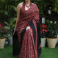 Sensuous maroon Ajrakh saree with black border & Accentuated with stone embellishment