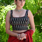 Smart Black Ikat Sleeveless Blouse with Red Detailing