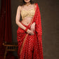 Radiant Red Bandhej Saree with Delicate Gold And Banarasi Detailing