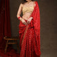 Radiant Red Bandhej Saree with Delicate Gold And Banarasi Detailing