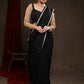 Classy Black Rayon Saree Adorned with Delicate Gold Hand Embroidery & Lace