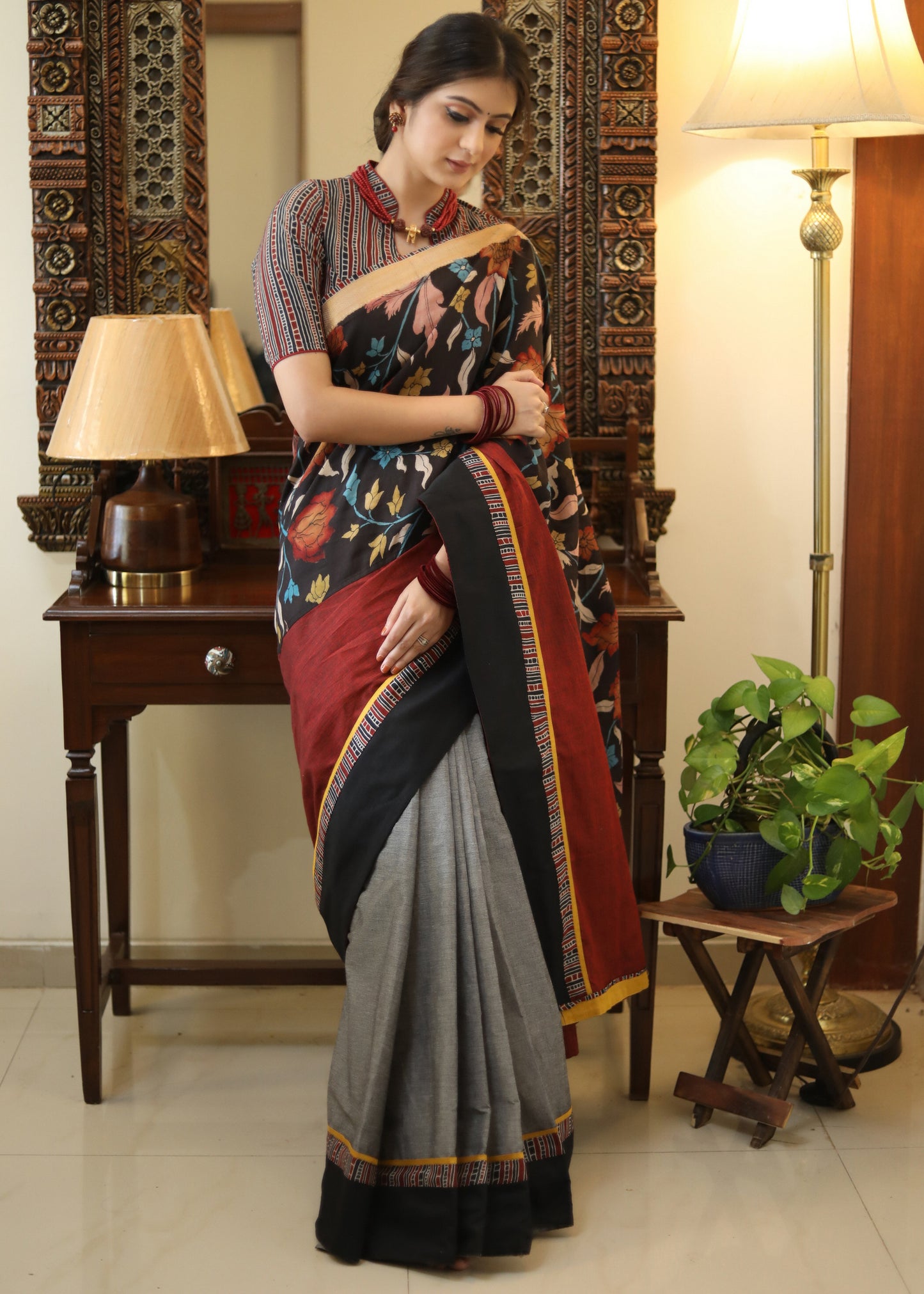 Smart grey Cotton saree with beautiful Madhubani Pallu and black border