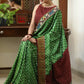 Gorgeous green Gajji Silk Bandhej saree with Kalamkari hand painted Pallu & line border