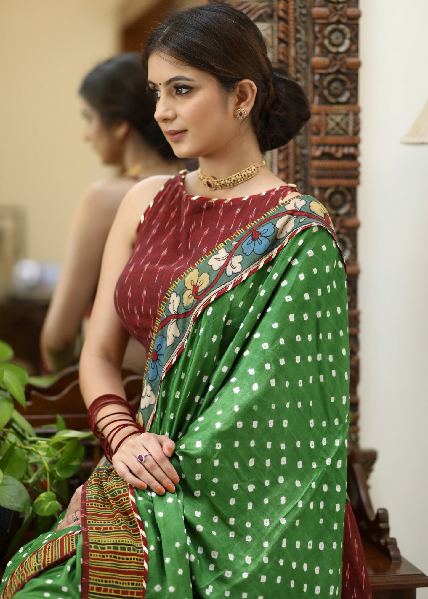 Gorgeous green Gajji Silk Bandhej saree with Kalamkari hand painted Pallu & line border