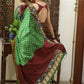 Gorgeous green Gajji Silk Bandhej saree with Kalamkari hand painted Pallu & line border