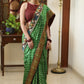 Gorgeous green Gajji Silk Bandhej saree with Kalamkari hand painted Pallu & line border