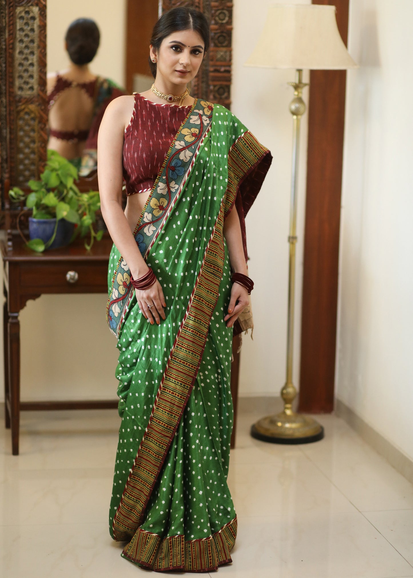 Gorgeous green Gajji Silk Bandhej saree with Kalamkari hand painted Pallu & line border