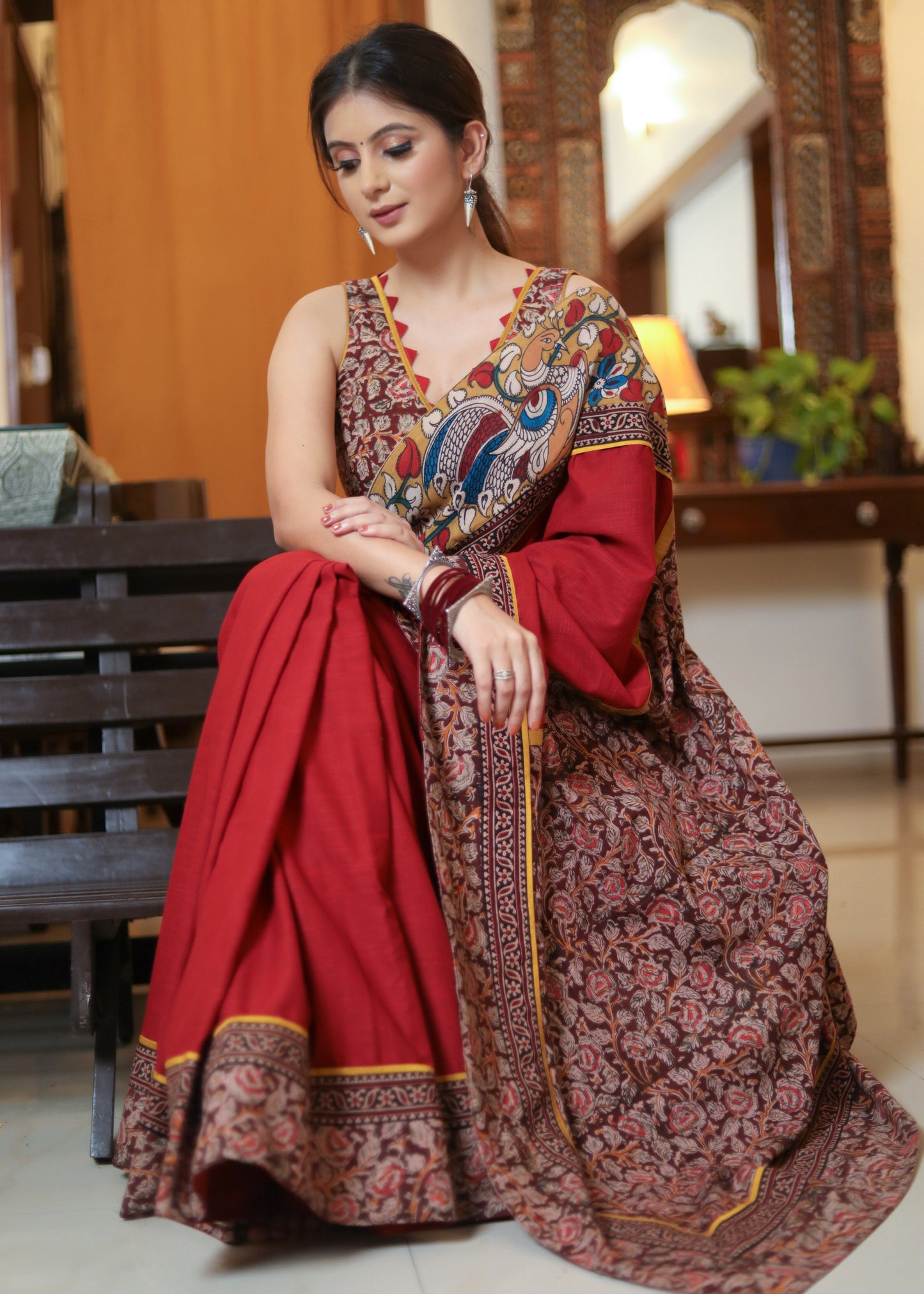 Exclusive maroon Cotton saree with Madhubani painting border and kalamkari print Pallu