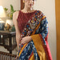 Lustrous blue printed saree graceful Madhubani painted Pallu with maroon and mustard border