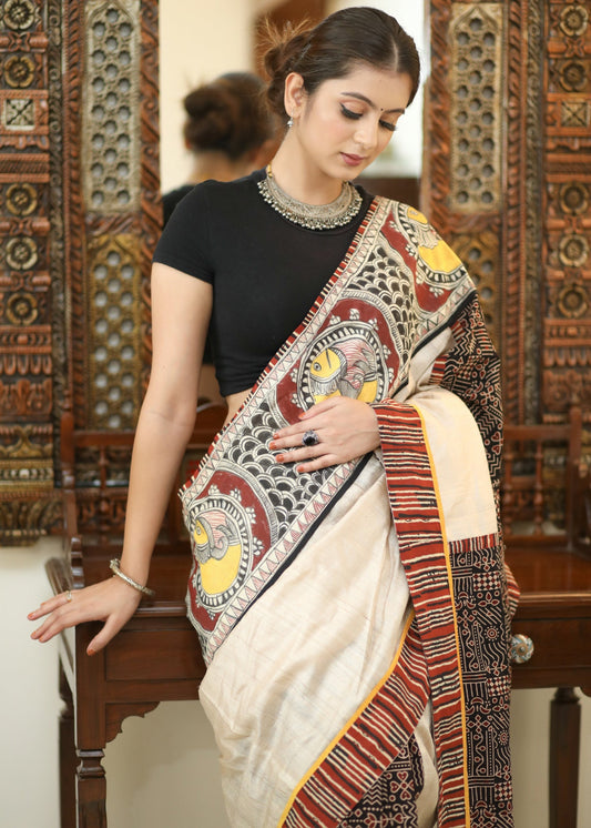 Elegant Cotton Ajrakh saree with Chanderi Pallu adorned with Madhubani painting.