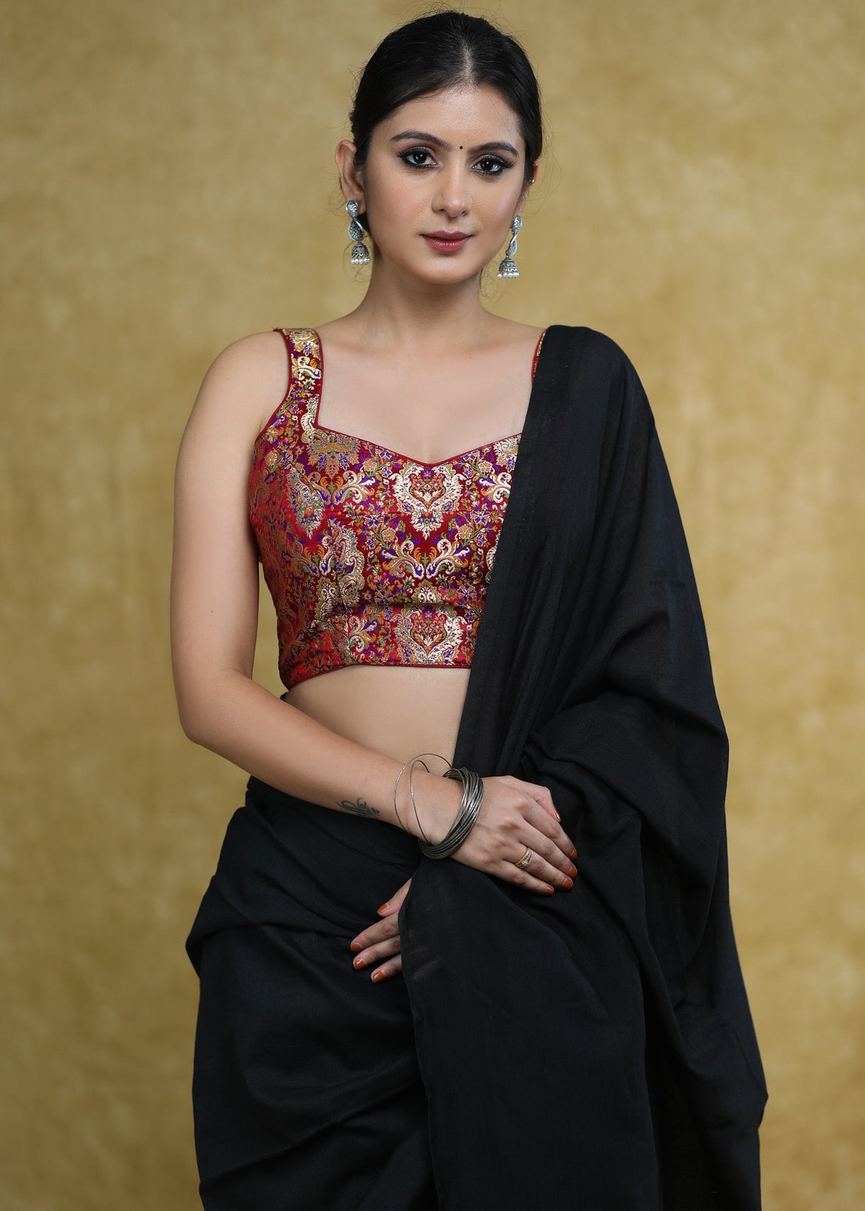 Standout Maroon Banarasi Sleeveless Blouse with Maroon Detailing