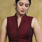 Graceful Maroon Mandarin Collar Sleeveless Blouse with Kalamkari Buttons and Kalamkari Back