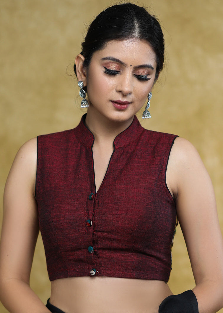 Graceful Maroon Mandarin Collar Sleeveless Blouse with Kalamkari Buttons and Kalamkari Back