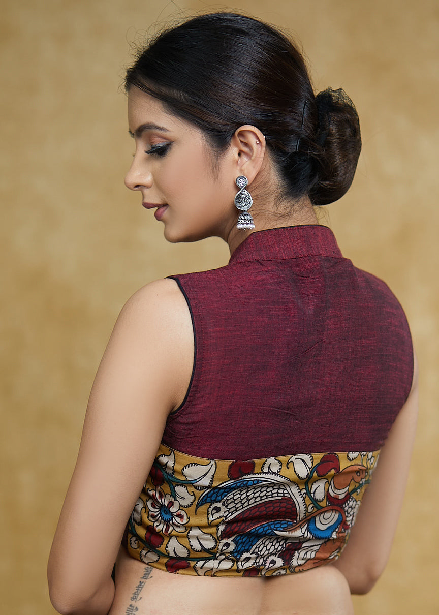 Graceful Maroon Mandarin Collar Sleeveless Blouse with Kalamkari Buttons and Kalamkari Back