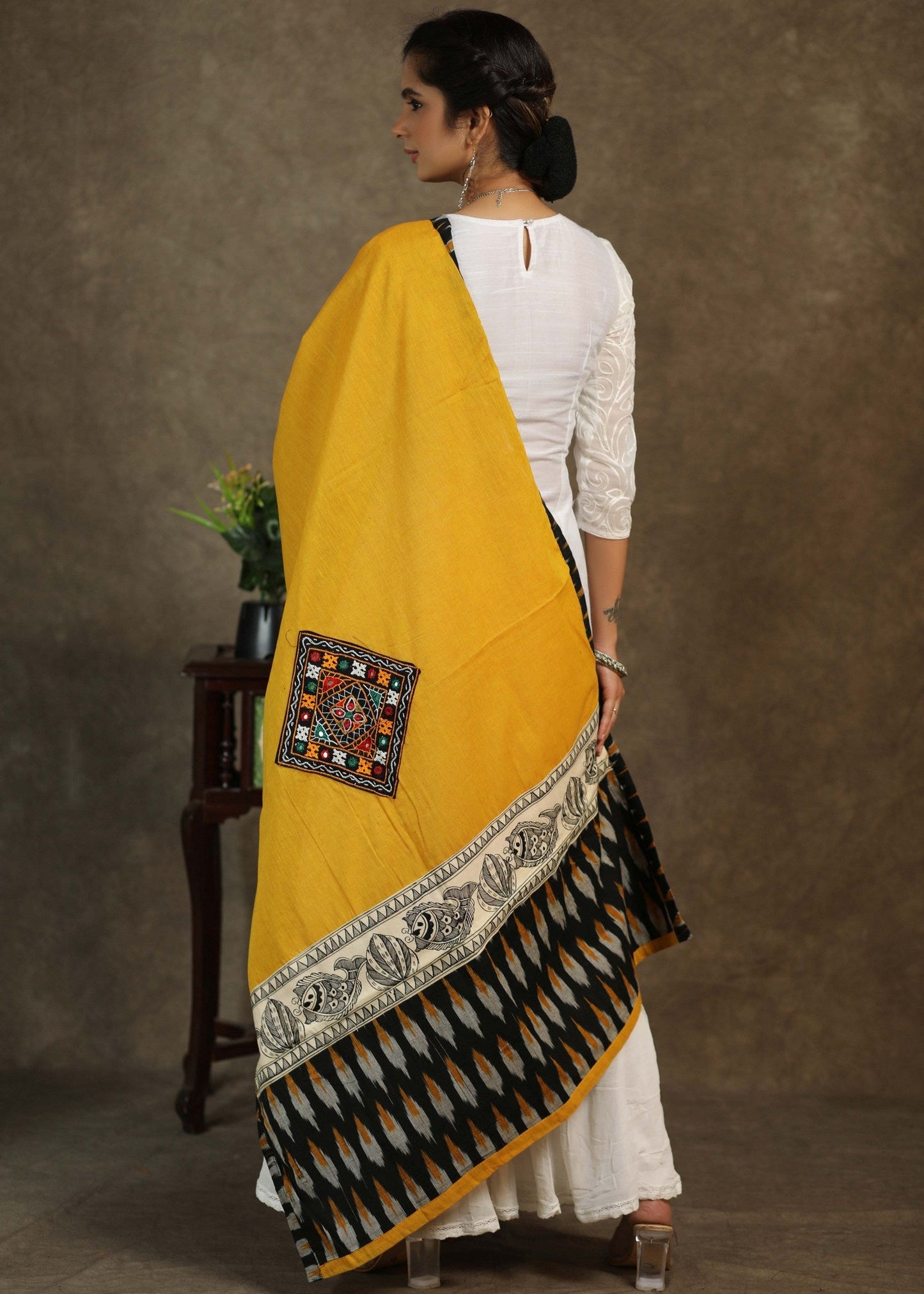 Elegant cotton mustard dupatta with exclusive hand painted Madhubani art and mirror work